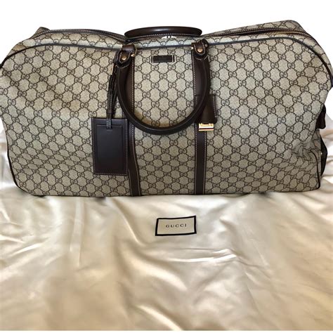 gucci travel bag with wheels|gucci official website.